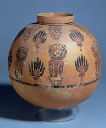Jar decorated with lion masks and cobra goddesses on lotus flowers, from Tomb 1090, Faras, Sudan